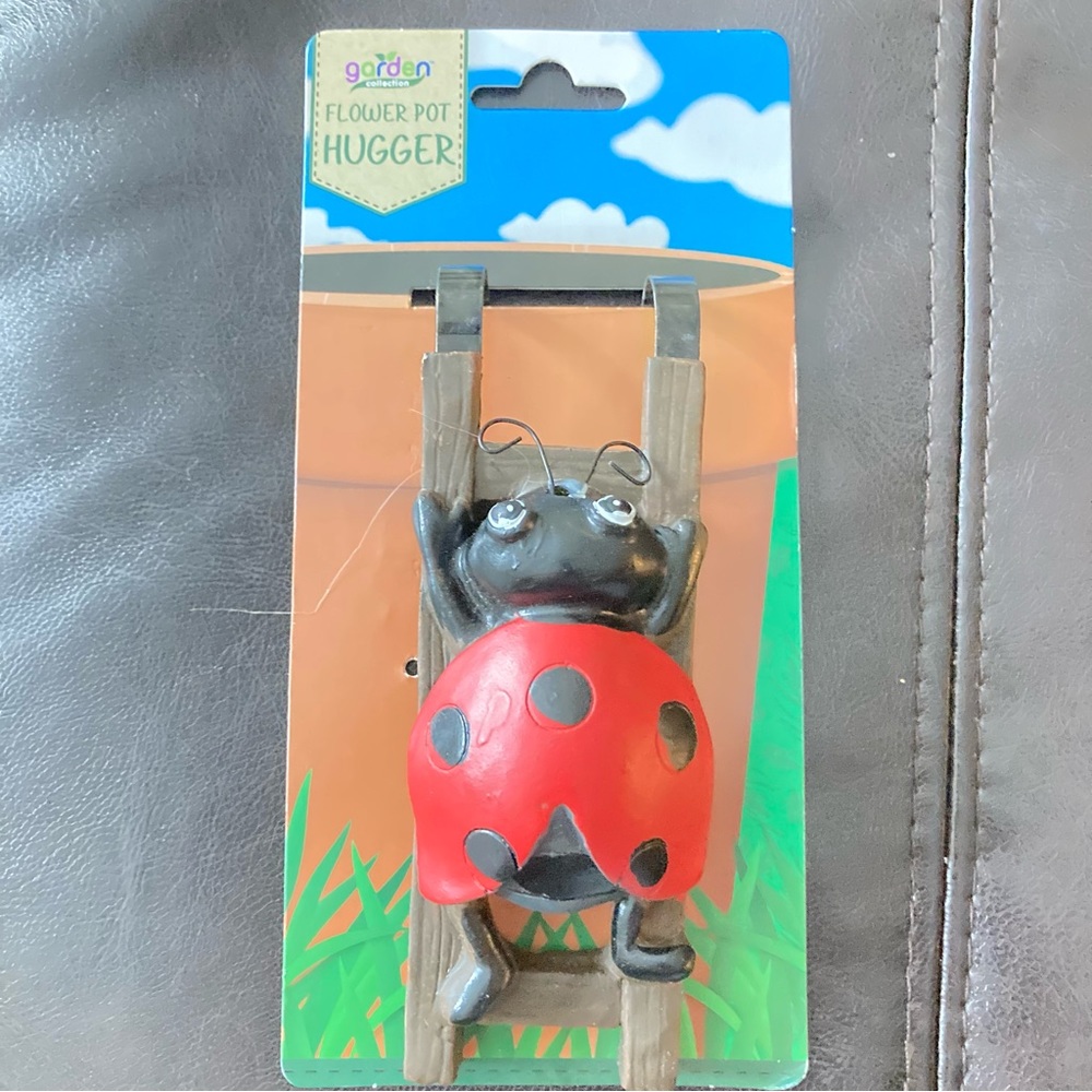 Flower pot hugger ladybug